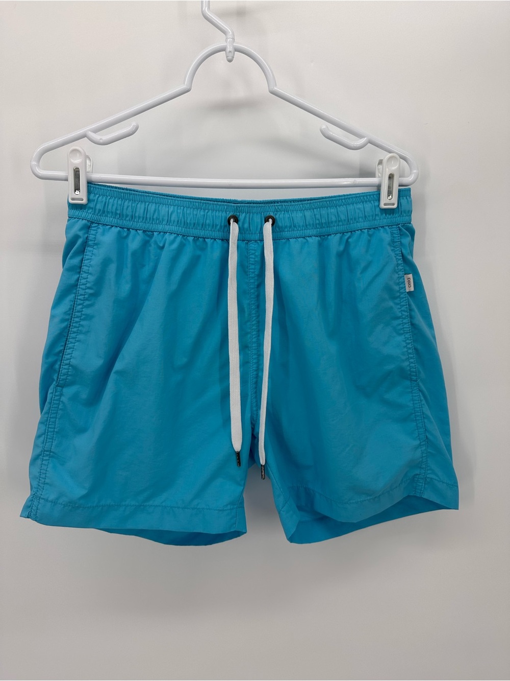 Men's Onia Turquoise Swim Trunks with drawstring and back pocket